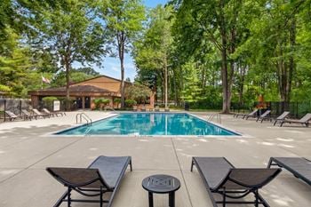 Heated swimming pool and sundeck at eastwood village apartments in clinton township, mi.